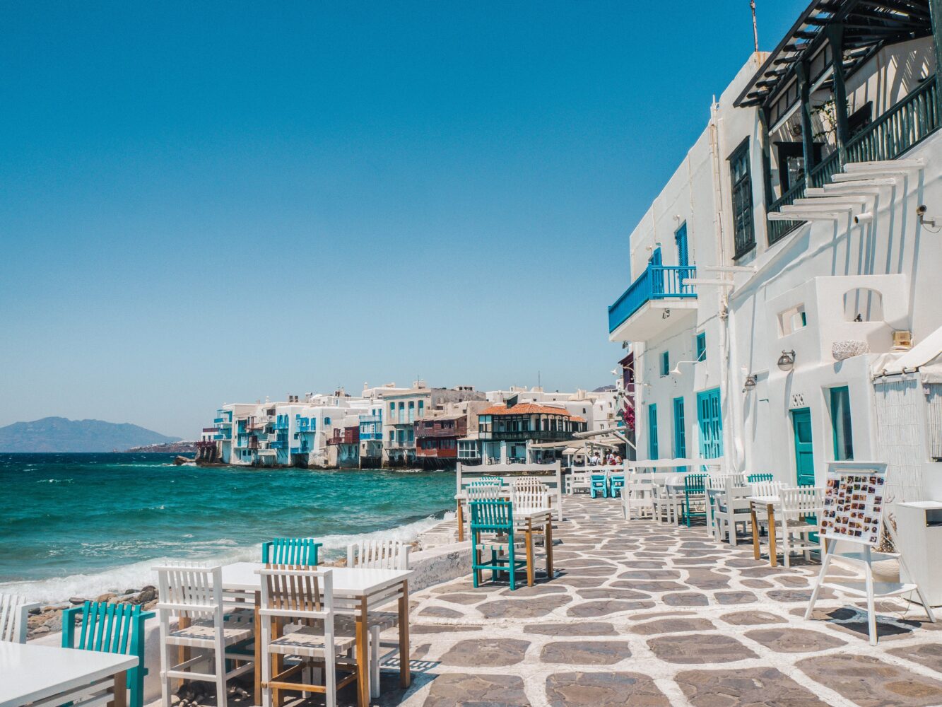 Inselhopping Kykladen: Mykonos, Naxos & Santorini Hintergrundbild Inselhopping Kykladen: Mykonos, Naxos & Santorini Hintergrundbild
